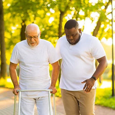 Afro with Elder walking zimmer park.jpg