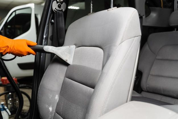 Illustrative image of a vehicle’s seats undergoing deep cleaning and stain & odor removal by CR7 Auto Detail in Orlando, FL