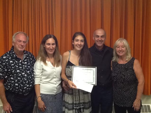 The DeMola Family are happy for daughter Julia as she receives CMT's Performing Arts Scholarship.
