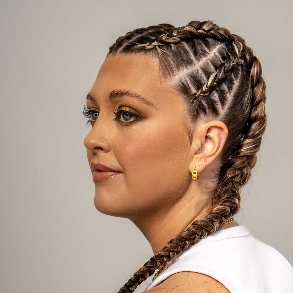 Woman wearing professionally styled Dutch braids 