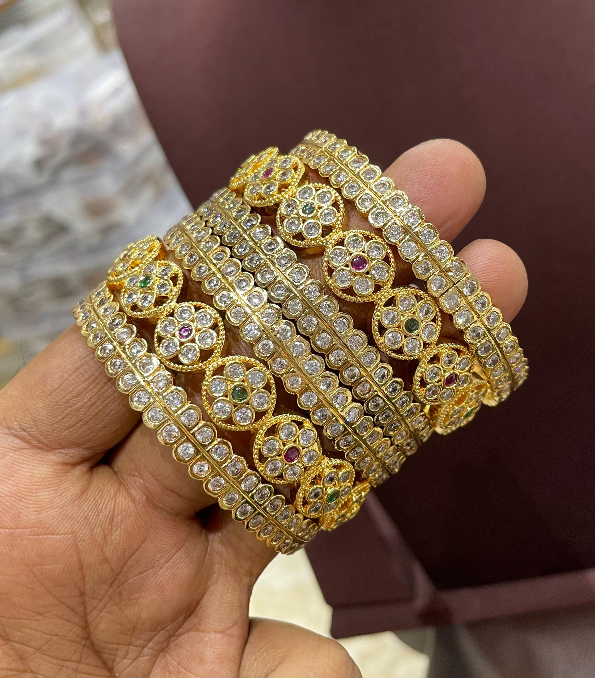 Gold polish AD bangles