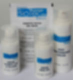 Eye-level view of a BIOTEC facial kit set on a wooden table