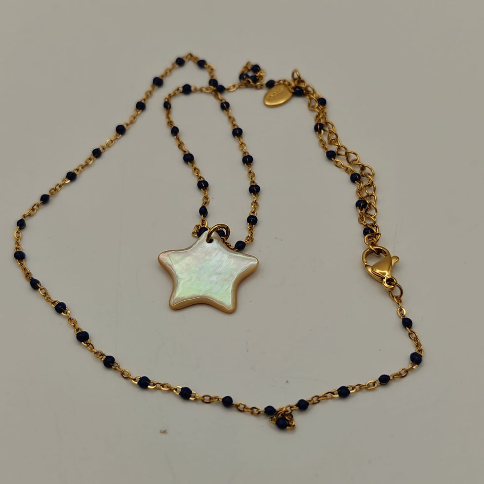 Miniature : Collier étoile en nacre d’Australie sur chaine dorée - Vue d'ensemble