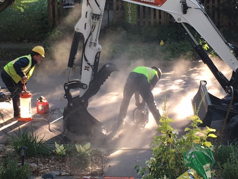 Cutting open the street, literally, with a saw. Who knew?