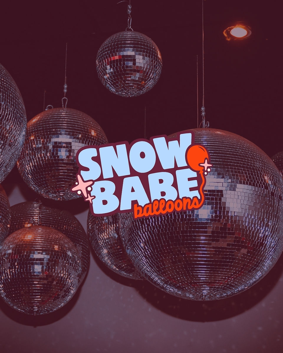 Full Snow Babe Balloons wordmark logo displayed over a moody photo of hanging disco balls