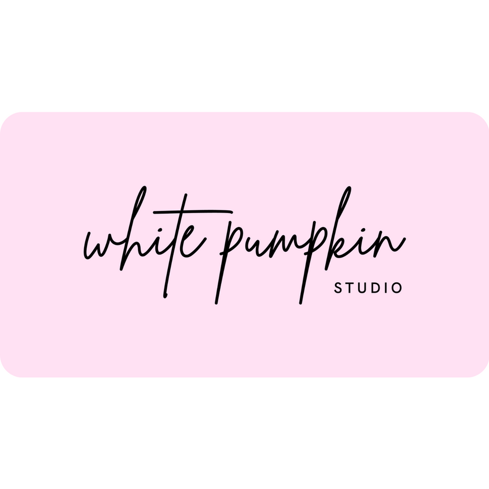 White Pumpkin Studio logo on pink background