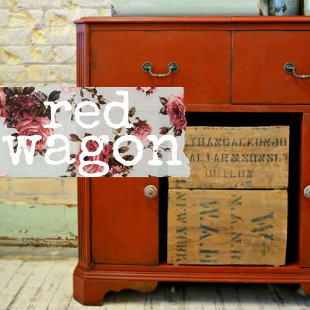 Sweet Pickins Milk Paint Red Wagon on a wooden dresser
