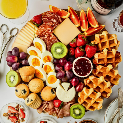 Brunch Charcuterie Mini waffles, muffins, croissants, fruit & cheese + champagne. for couples massages and girls spa days