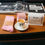Thumbnail: Pink socks and coffee cup, BlueChip package, and magazines on wooden table.