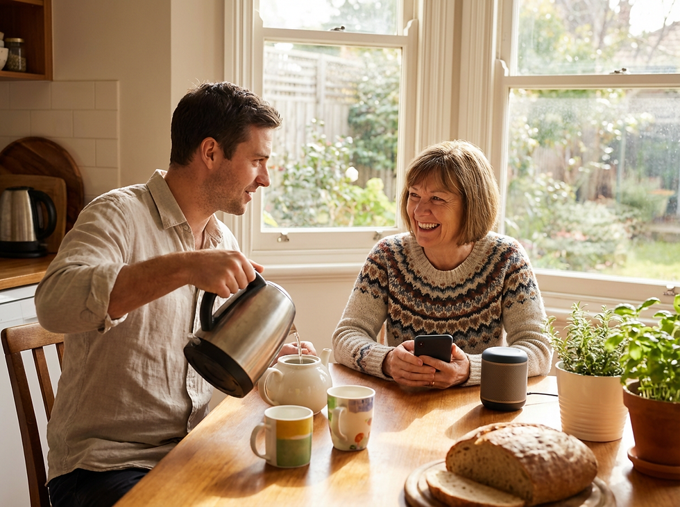 Adult son making tea in the kitchen while a small speaker plays a personalised song for Mum at the table.