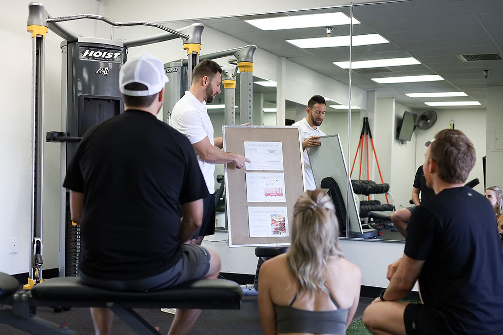 Mike leading a small group discussion about functional lab testing and how it impacts recovery and performance