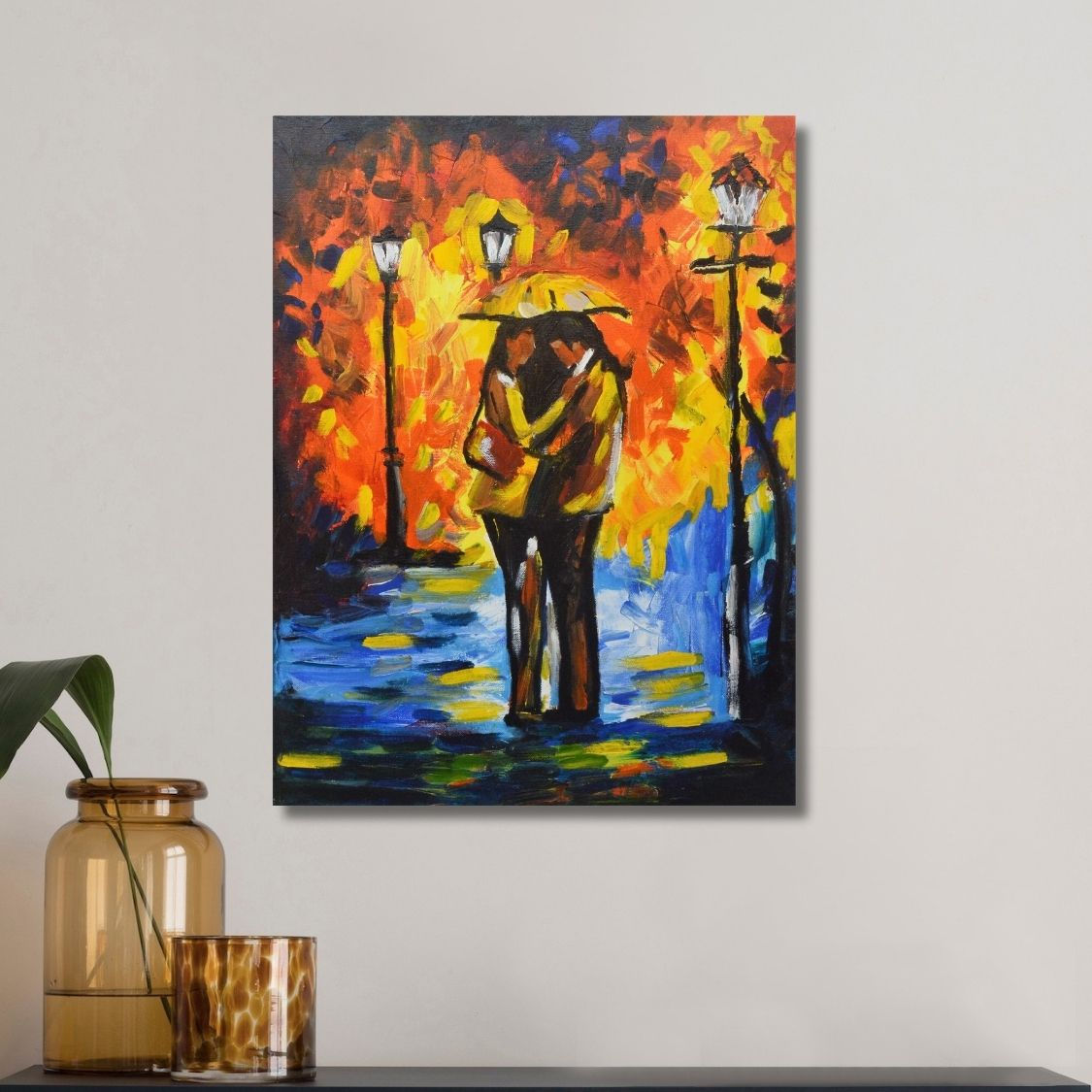 Couple embracing in city lights painting