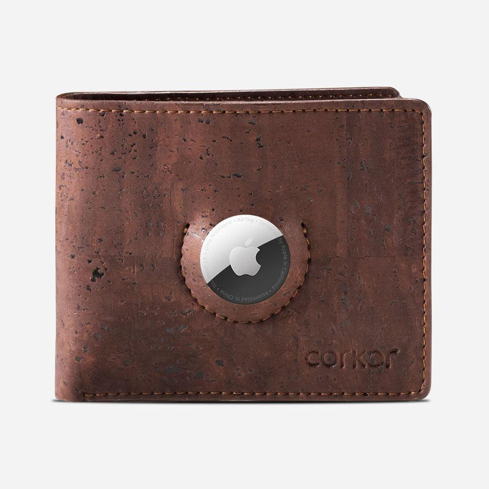 Front view of a closed cork bifold vegan wallet showing a custom integrated circular slot securely holding an Apple AirTag