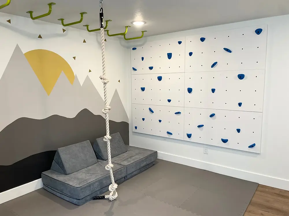 Modern playroom renovation with climbing wall