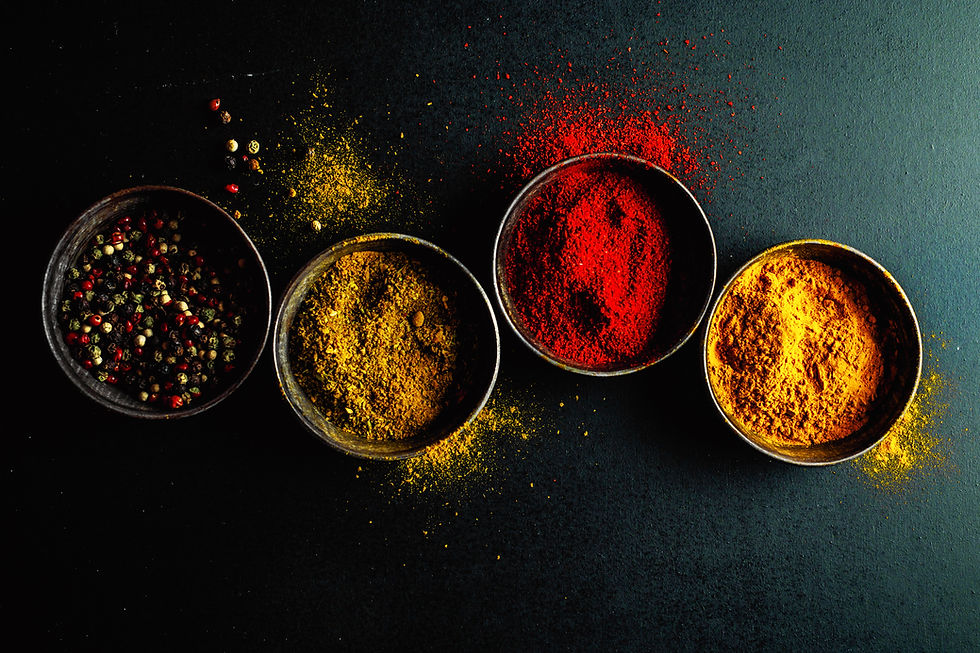 colorful-spices-dark-table.jpg