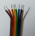 The ends of the wires can be feathered by splitting the wires away from each other. This will allow the wires to reach each side of the plug, as well as increase accessibility for crimping.