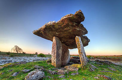 A Poulnabrone dolmen consists of a large capstone resting on two upright stones.