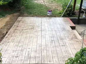 Stamped concrete patio with wood plank pattern