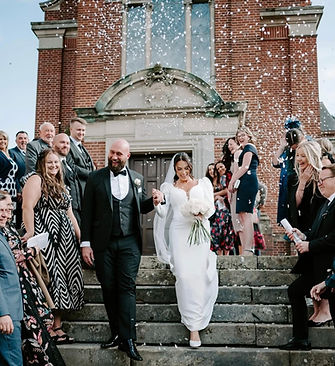Bride & Groom just married with confetti