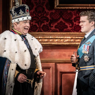 Theatre Lighting Programmer London a man in a crown stands next to another man in a military uniform