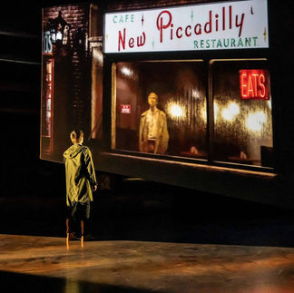 Lighting Programmer London a person standing in front of a restaurant called new piccadilly
