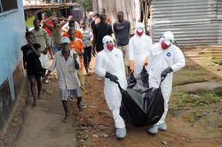 Health Workers Remove Body Of Prince Nyentee A 29-year-old Man Who Died From Ebo
