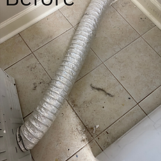 Behind the dryer (before)