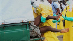 Health Workers Push Ebola Patient Who Escaped Quarantine From Monrovias Elwa Hos