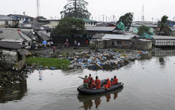 Liberian Security Forces Patrol Waters Around Ebola Quarantine Area Of West Poin