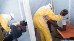 Ebola Health Care Workers Treat Ebola Patients.jpg
