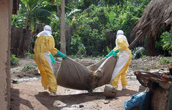 Ebola Burial Team Buries Another Ebola Victim.jpg