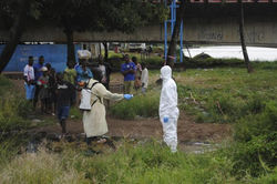 Health Worker Has His Protective Suit Sprayed With Chlorine Disinfectant After M