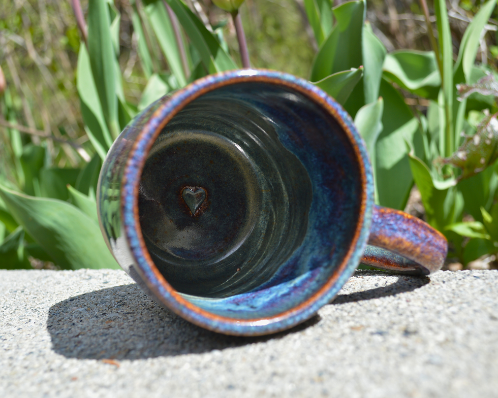 Thumbnail: Handmade pottery mug with brown undertones and rainbow overtones