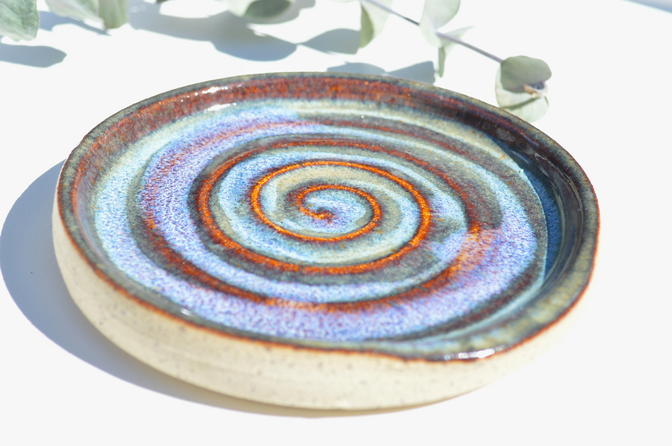 Thumbnail: Pottery spoon rest in razzle dazzle
