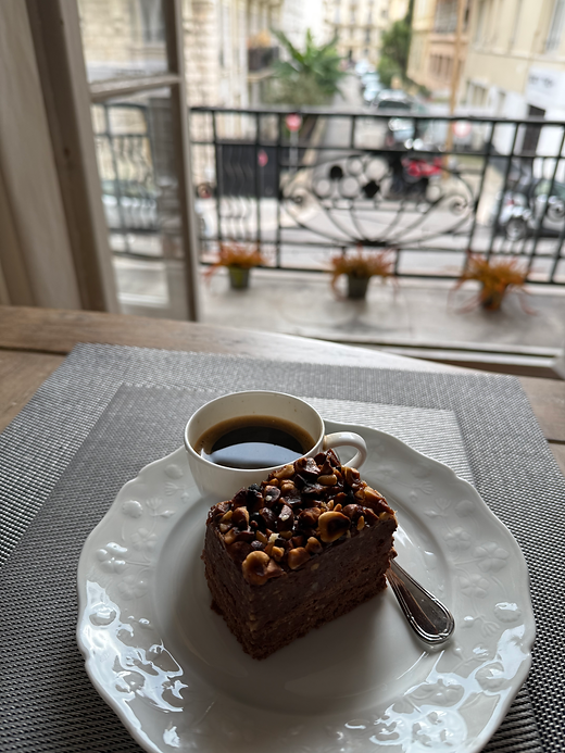 coffee and chocolate cake in our apartment window