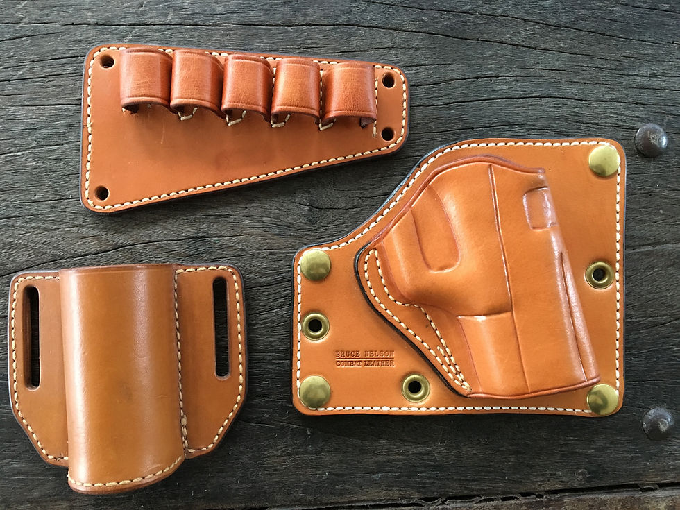Lower left is a Suppressor Holster Lower right Briefcase Glock 19 Holster
