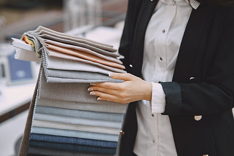 woman-customer-looking-beautiful-fabric-drapery-shop.jpeg