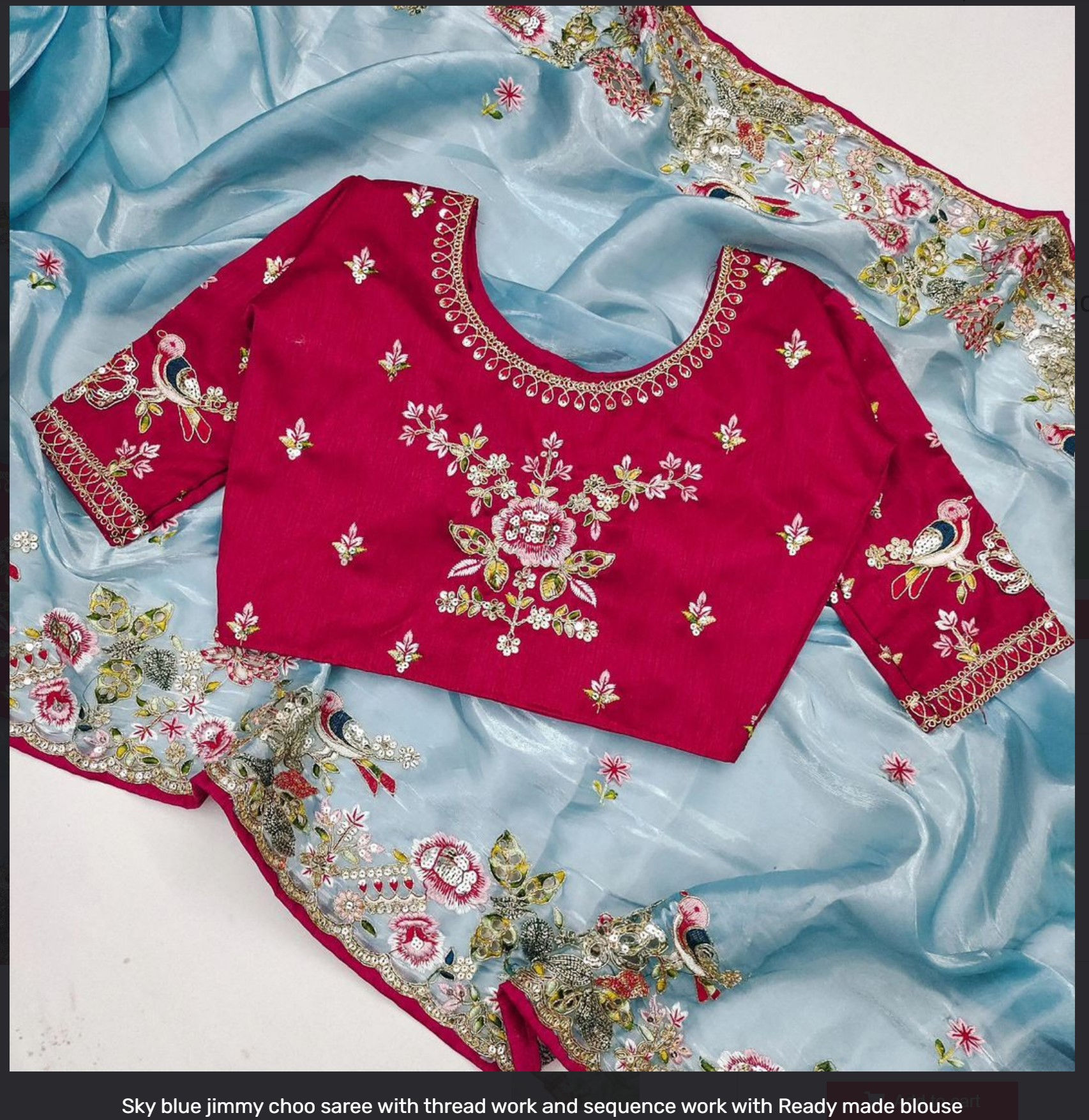 Sky blue jimmy choo saree with thread workwith readymade blouse