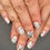Thumbnail: Product sheet of Spooky Doodles nail wraps showing Halloween doodle art of Mickey in skeleton costume, Minnie, owls, pumpkins