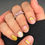 Thumbnail: Disney wedding nail wraps – Heir to a Dream soft pink and gold castle inspired nails