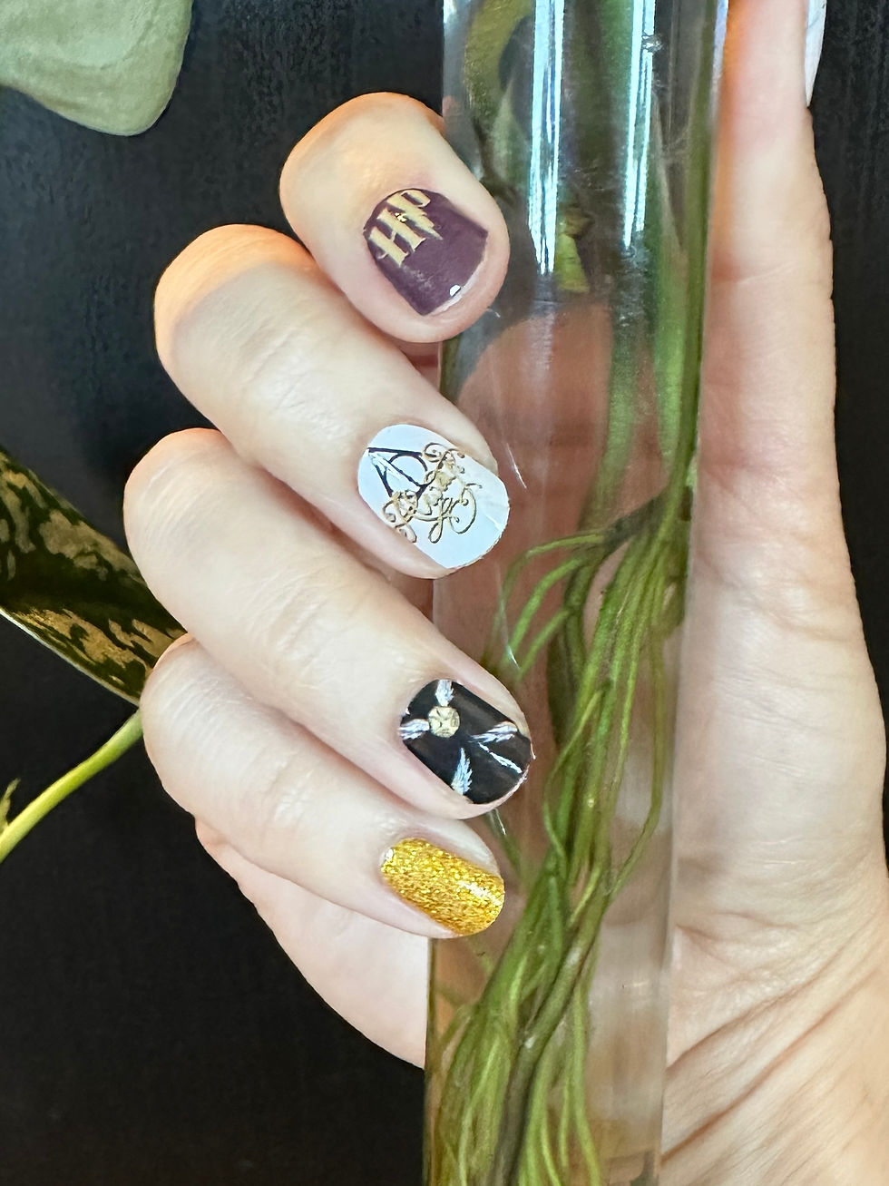 Thumbnail: Harry Potter Inspired Nails – Mischief Managed burgundy and gold magical nail art