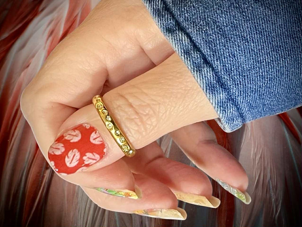 Thumbnail: Hawaiian-themed Stitch nail wraps with colorful tropical prints, footprints in sand, glittery ocean blue, and luau vibes