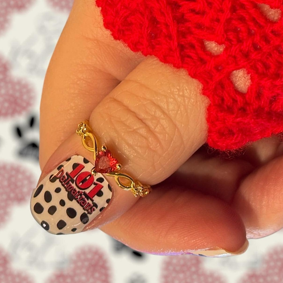 Thumbnail: Puppy-inspired black and white nail art featuring Dalmatian-style dots