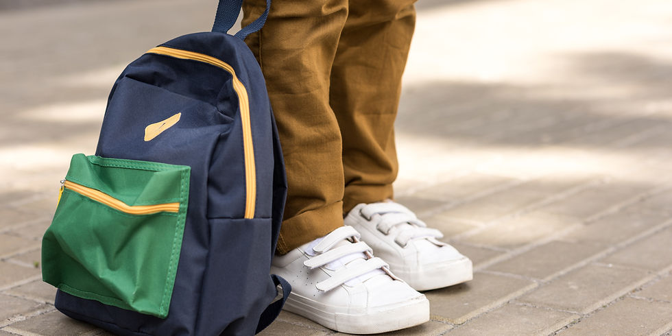 A school bag on the ground, a symbol of back-to-school season and everyday life in France.
