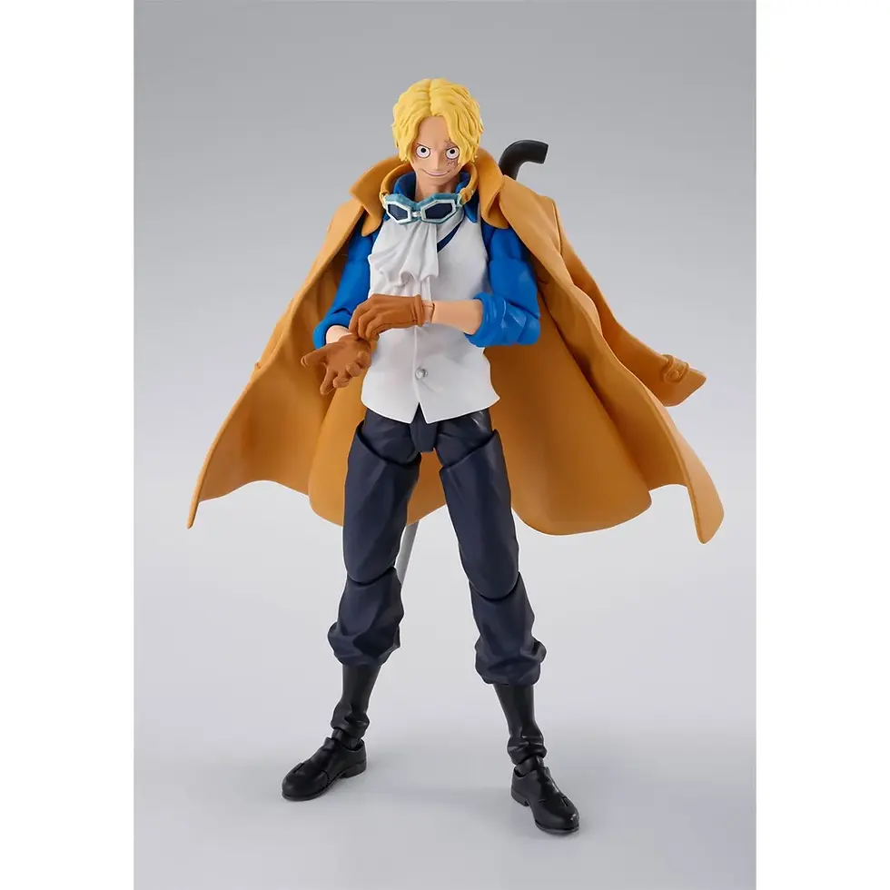 Thumbnail: Sabo figure with a cape, standing, in an action pose, with a staff.