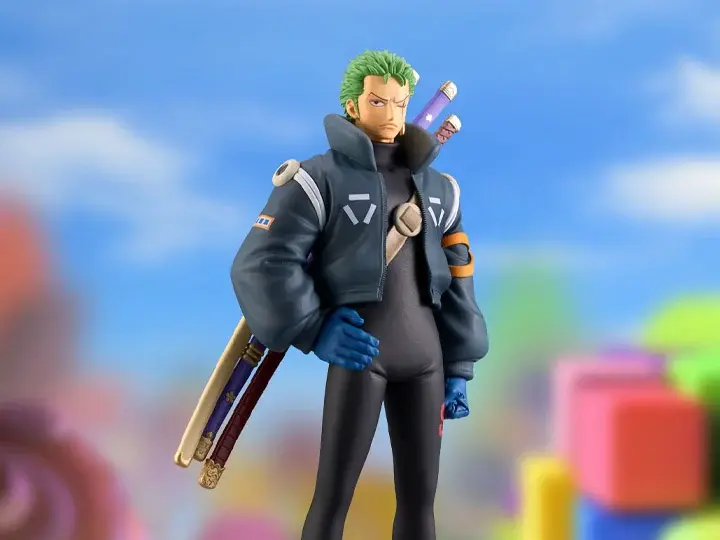 Thumbnail: One Piece figure of Zoro with swords and blue jumpsuit, looking determined