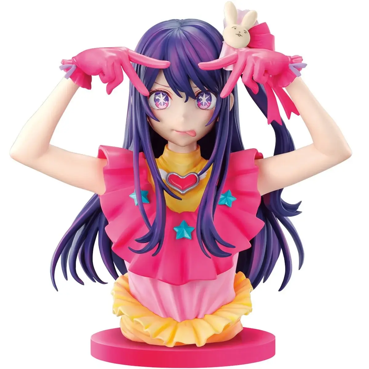 Anime figure with purple hair and gesture hands. Pink outfit and stars. 
