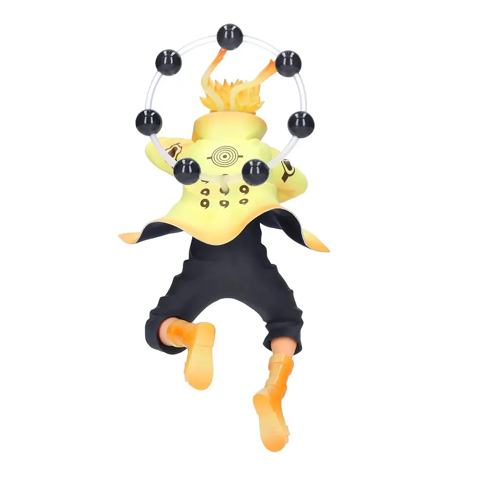 Thumbnail: Naruto figure with black spheres and yellow cloak. Anime character toy.
