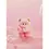 Thumbnail: Pink fluffy monster figure holding a white heart against a soft pink background.