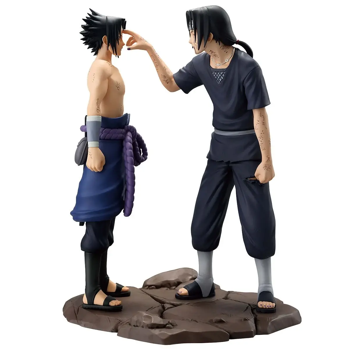 Sasuke and Itachi figurines standing on a rock; anime characters, close up pose action.